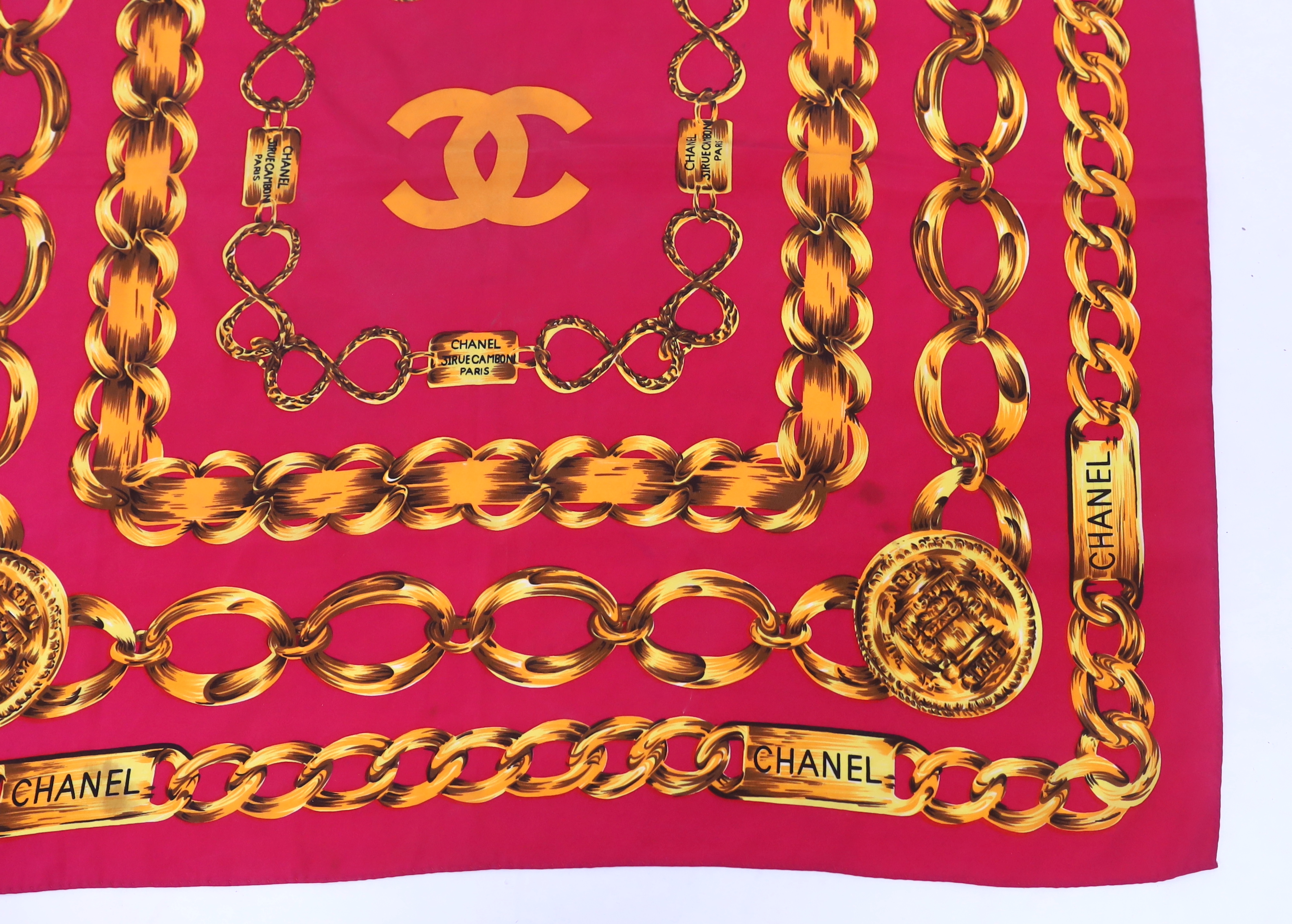 A Chanel Chain pink and gold silk scarf, 80cm x 80cm